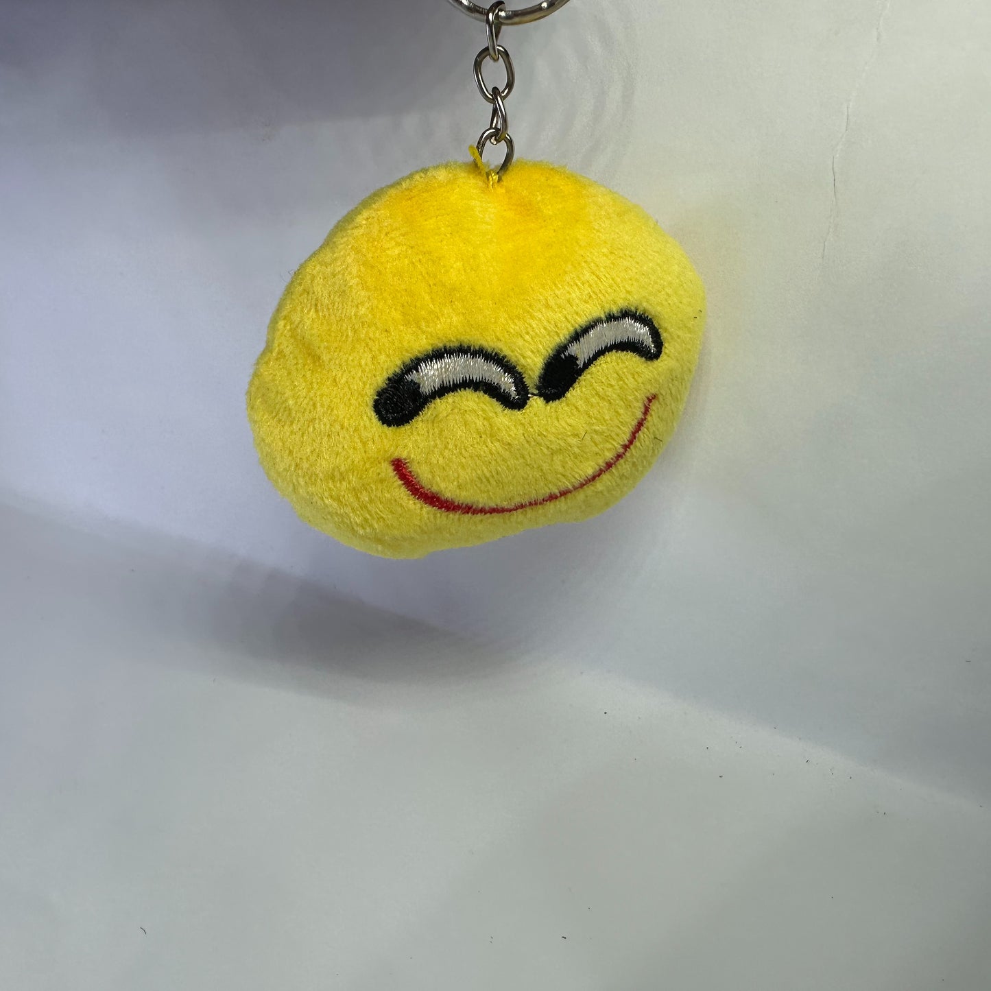 Cute Relaxed Face fluffy keychain.