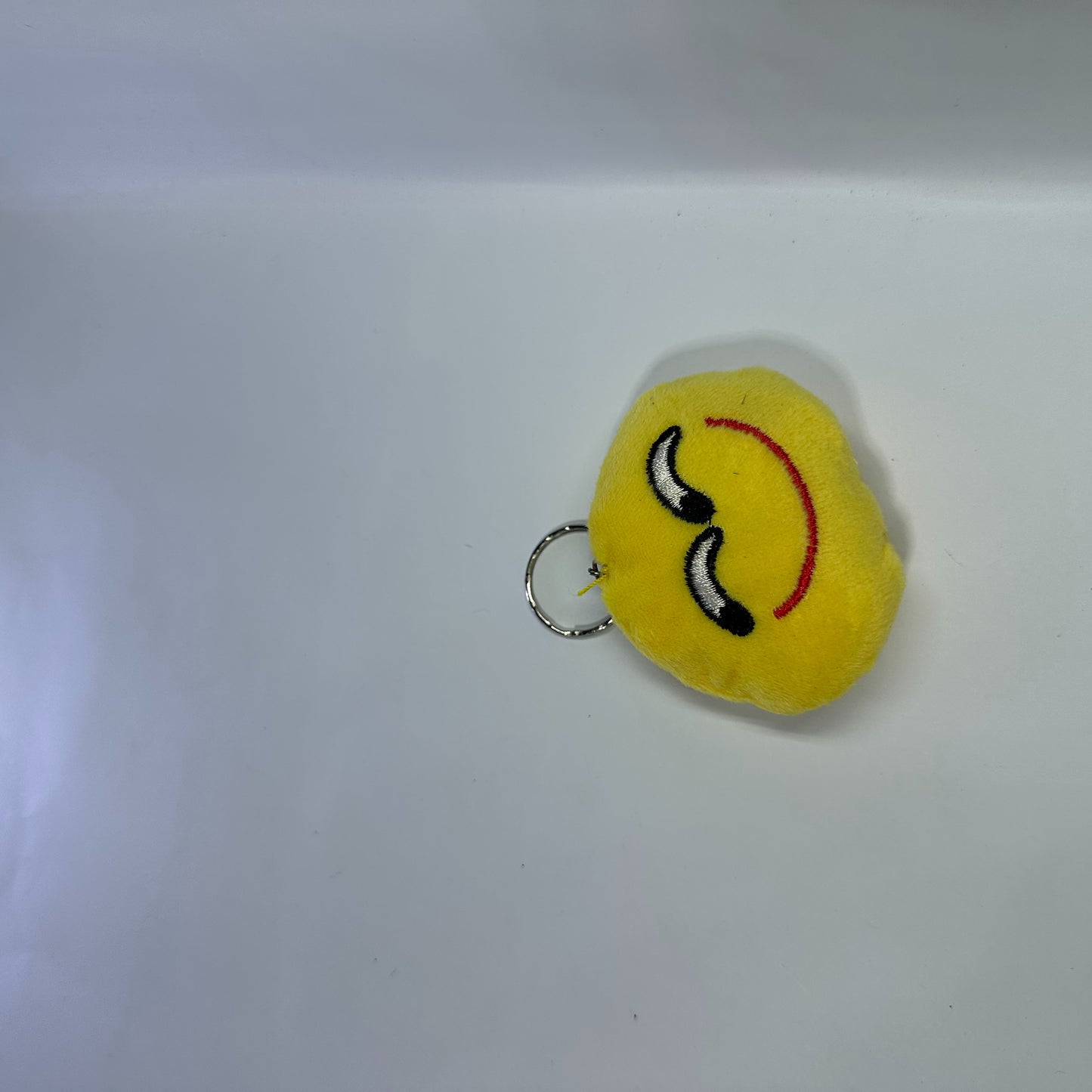Cute Relaxed Face fluffy keychain.
