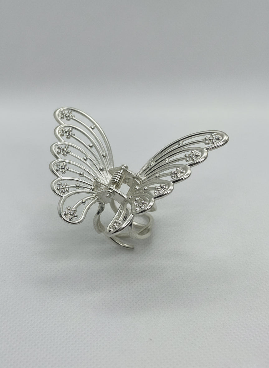 Gold metal butterfly hair claw.