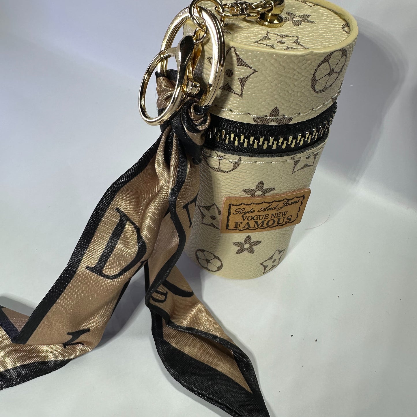 Louis Vuitton (LV) small leather bag key chain for jewelery