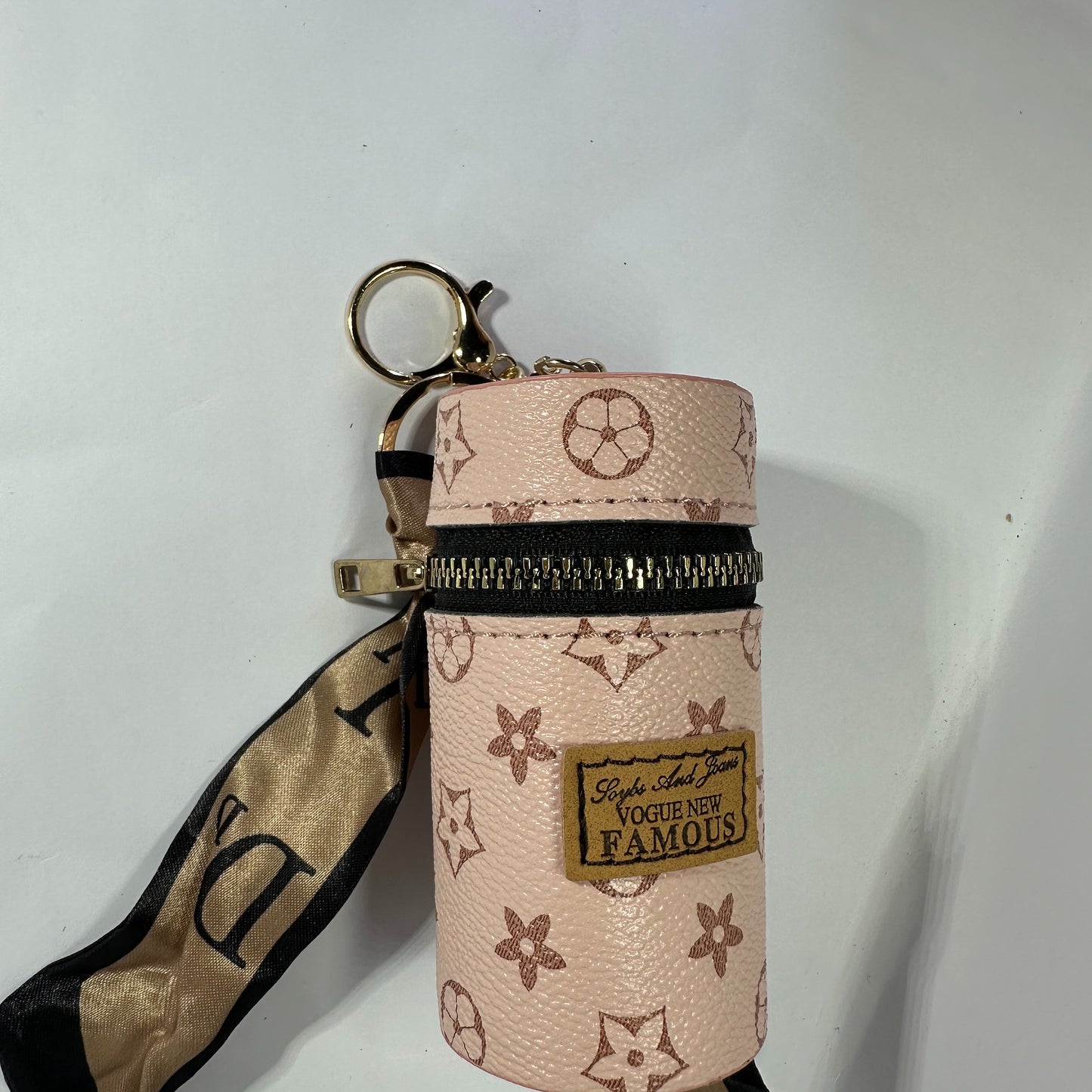 Louis Vuitton (LV) small leather bag key chain for jewelery