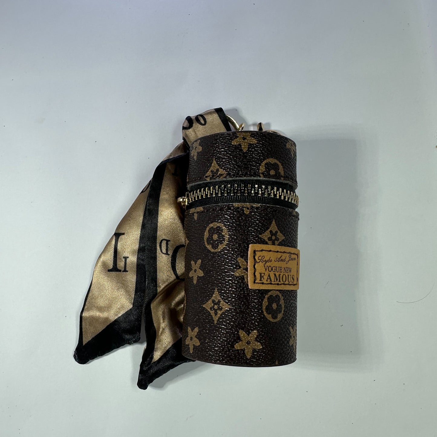 Louis Vuitton (LV) small leather bag key chain for jewelery