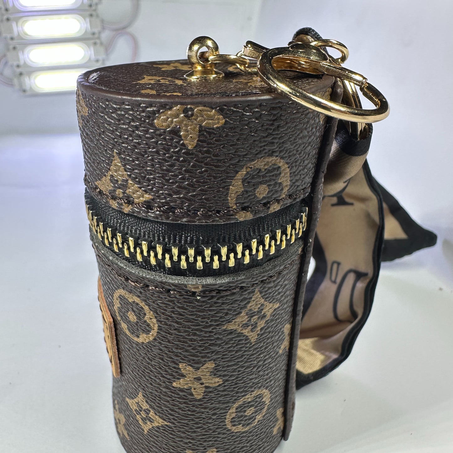 Louis Vuitton (LV) small leather bag key chain for jewelery