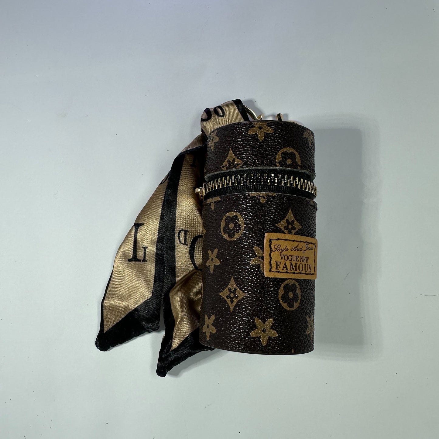 Louis Vuitton (LV) small leather bag key chain for jewelery