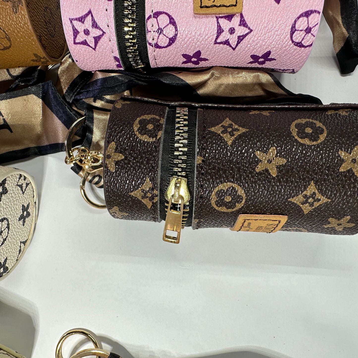 Louis Vuitton (LV) small leather bag key chain for jewelery