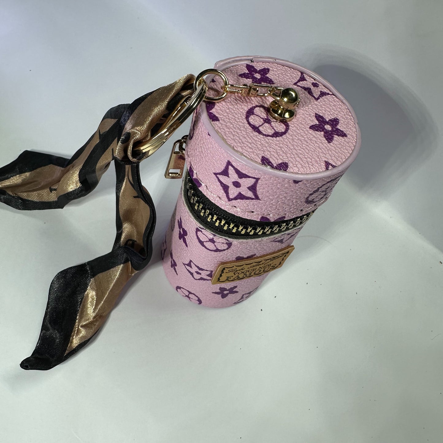 Louis Vuitton (LV) small leather bag key chain for jewelery