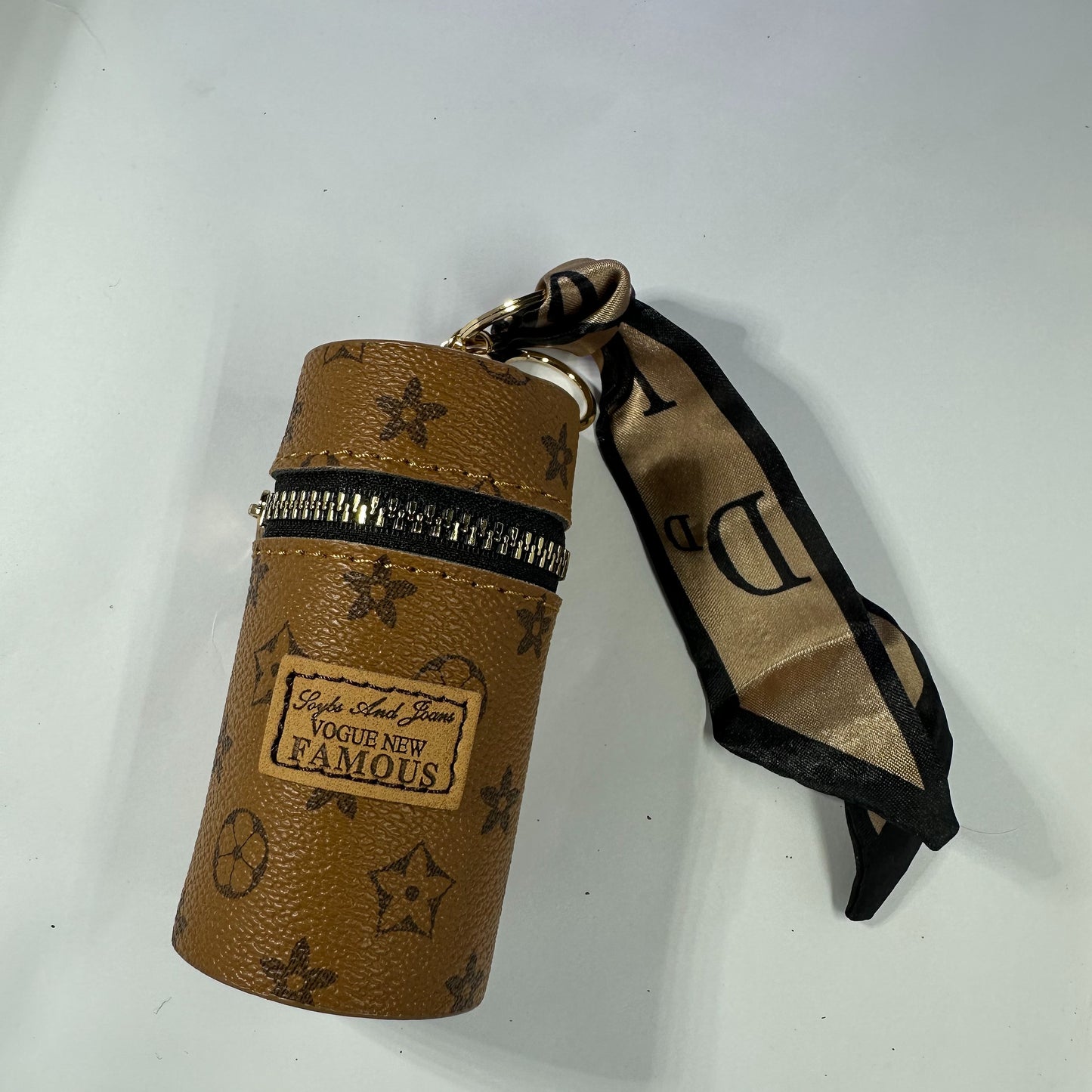 Louis Vuitton (LV) small leather bag key chain for jewelery