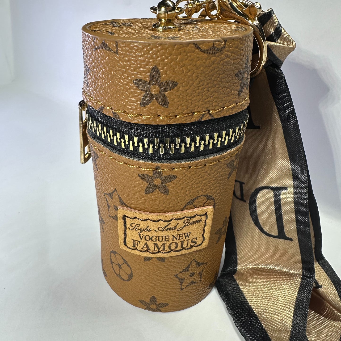 Louis Vuitton (LV) small leather bag key chain for jewelery