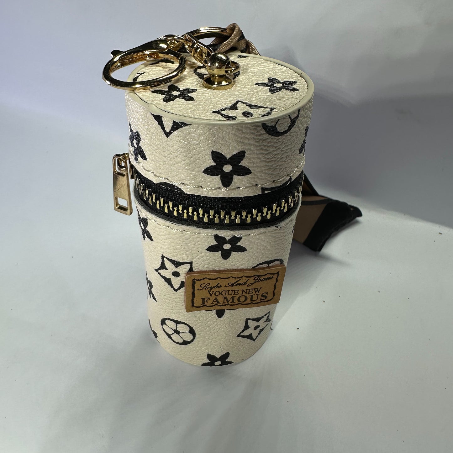 Louis Vuitton (LV) small leather bag key chain for jewelery