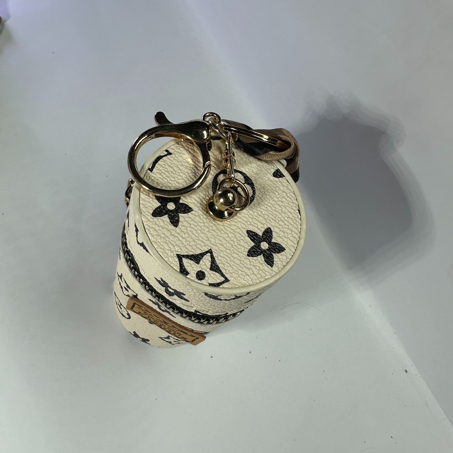 Louis Vuitton (LV) small leather bag key chain for jewelery