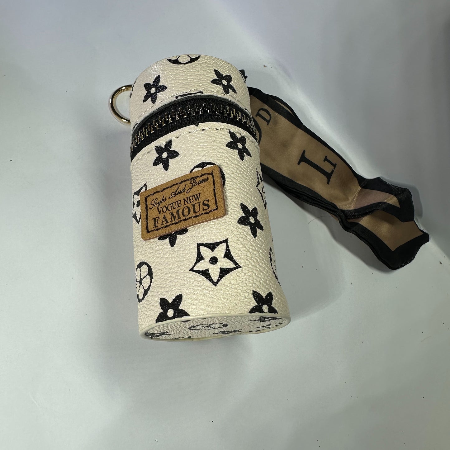 Louis Vuitton (LV) small leather bag key chain for jewelery