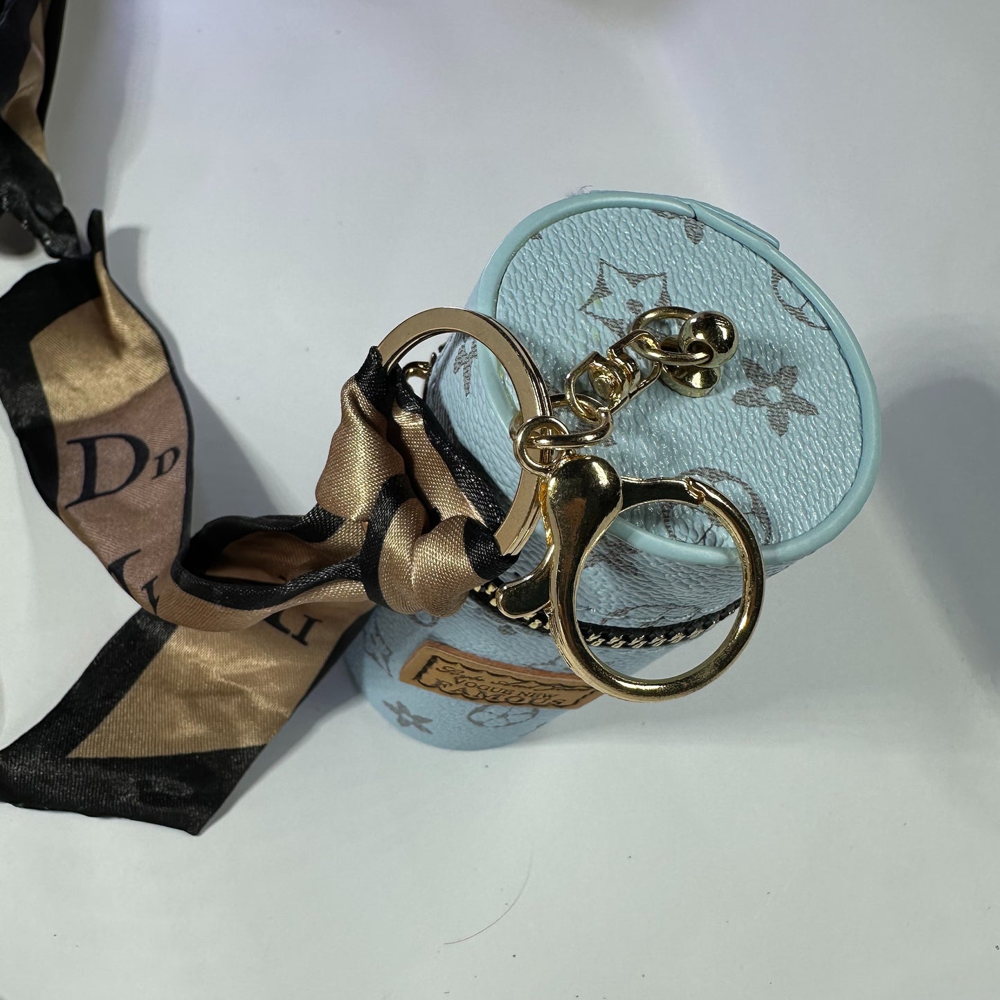Louis Vuitton (LV) small leather bag key chain for jewelery