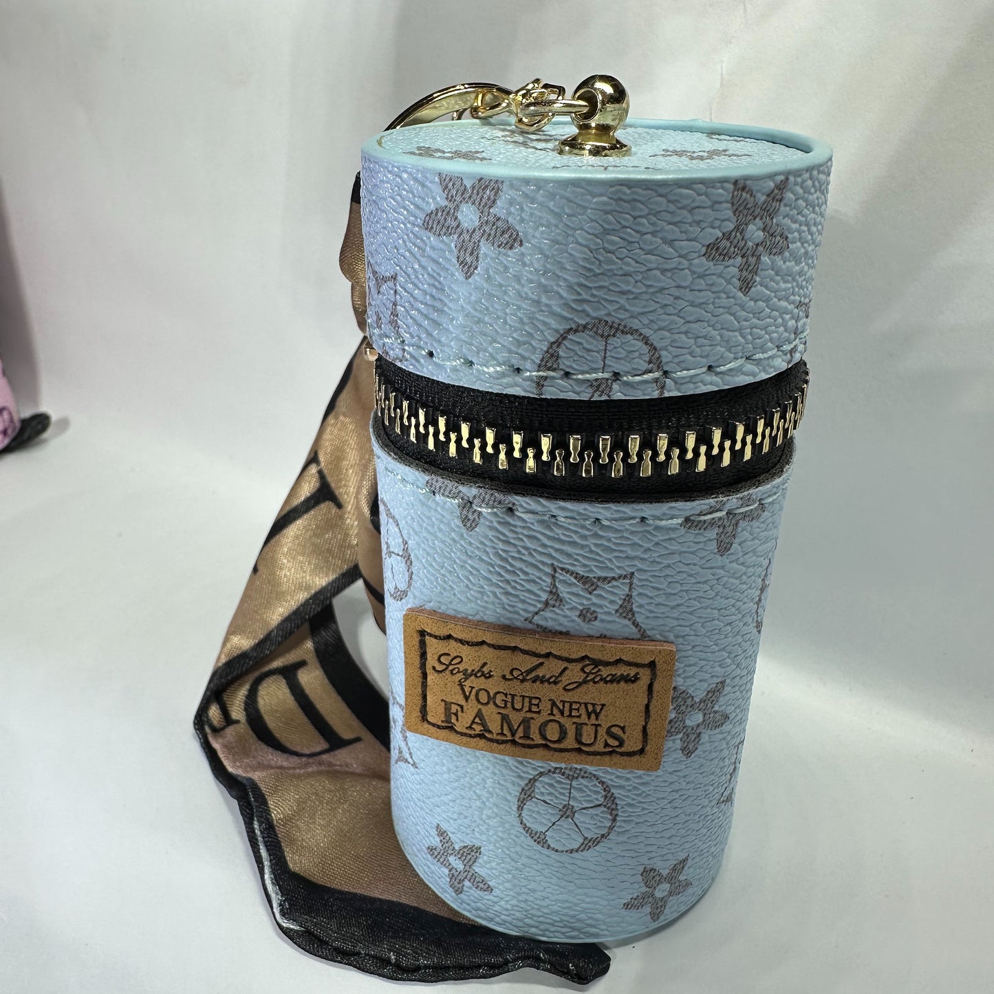 Louis Vuitton (LV) small leather bag key chain for jewelery