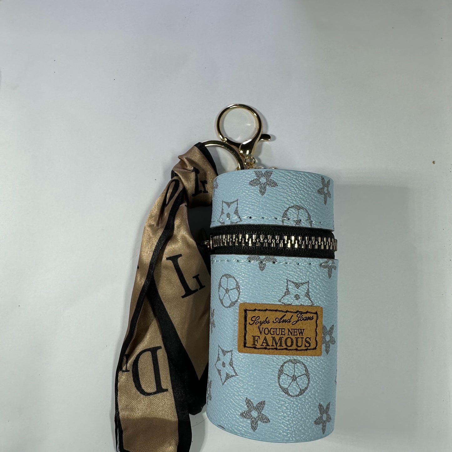 Louis Vuitton (LV) small leather bag key chain for jewelery