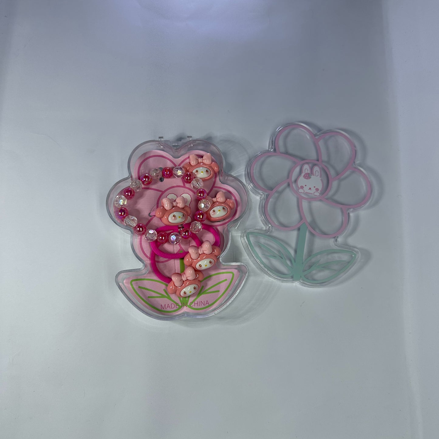 Pack of 4 hairpins, bracelet, ring, hair bands