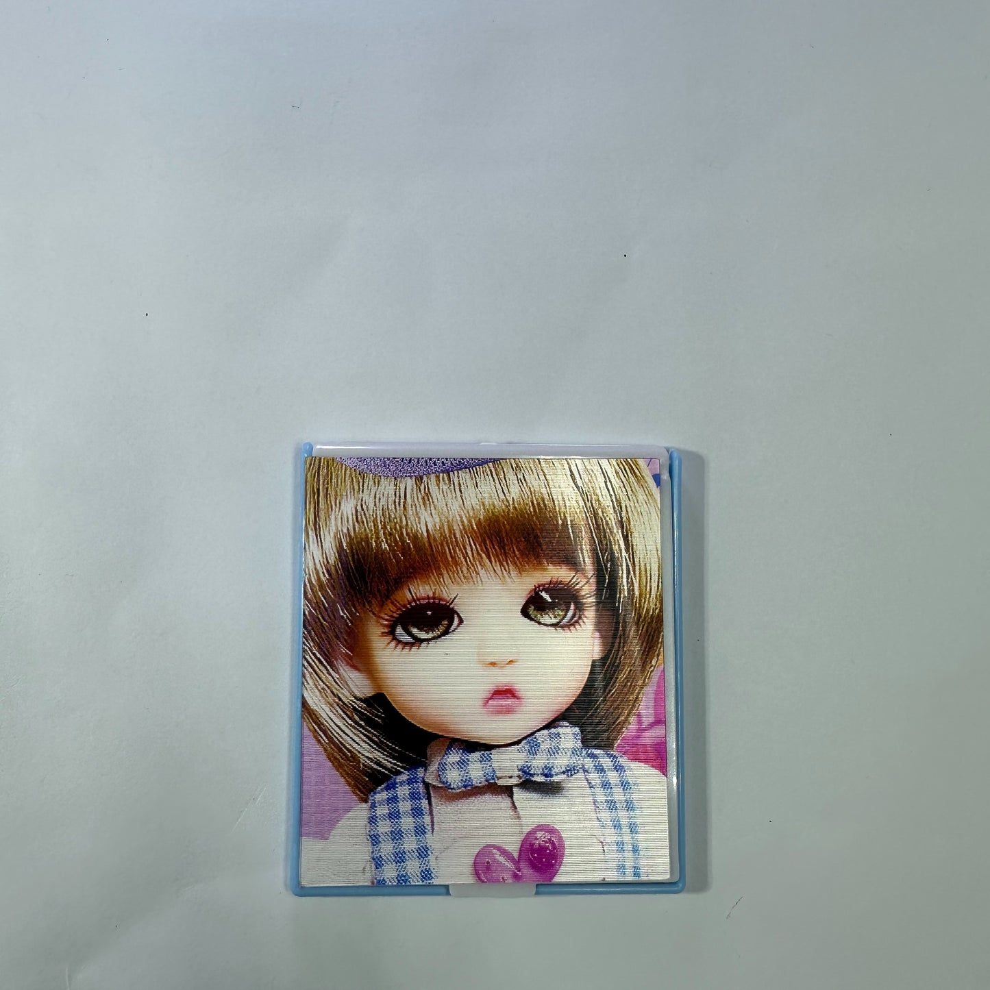 Pocket mirror with dolls