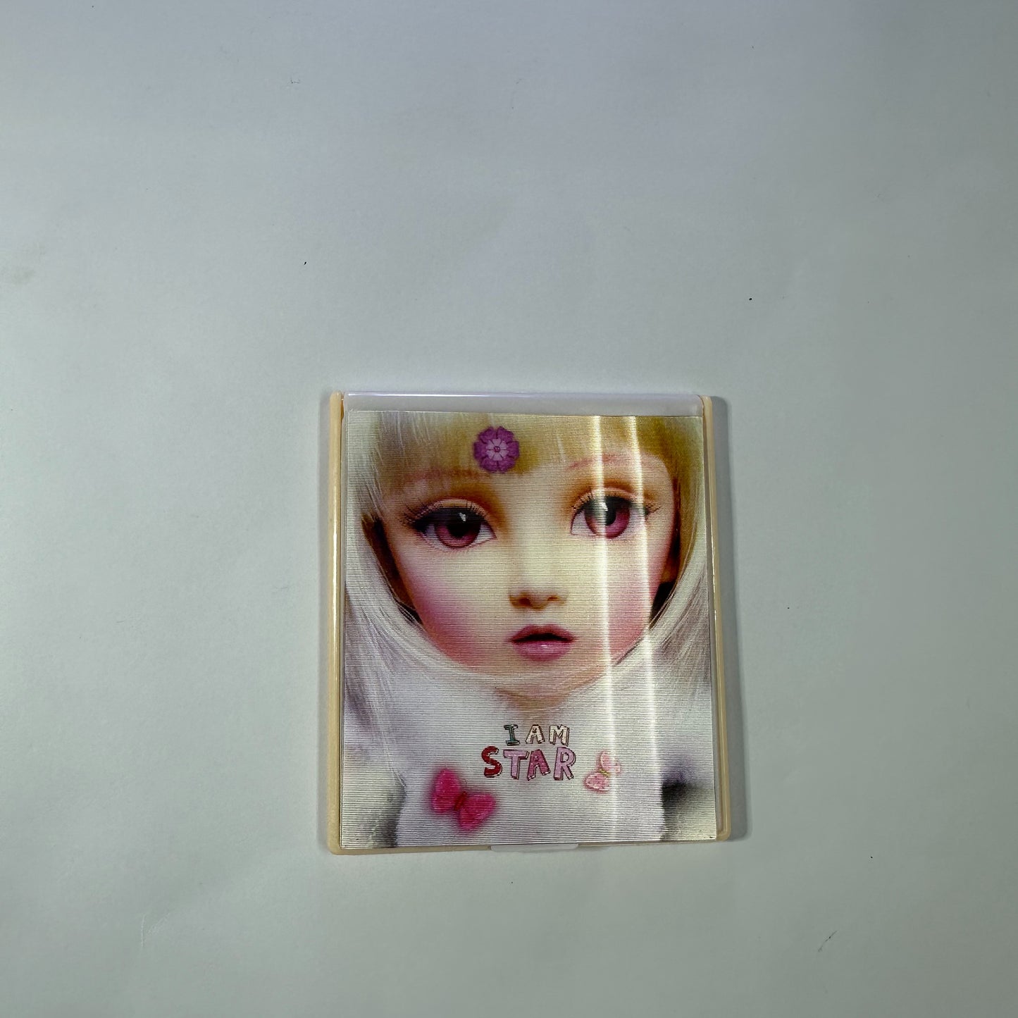Pocket mirror with dolls