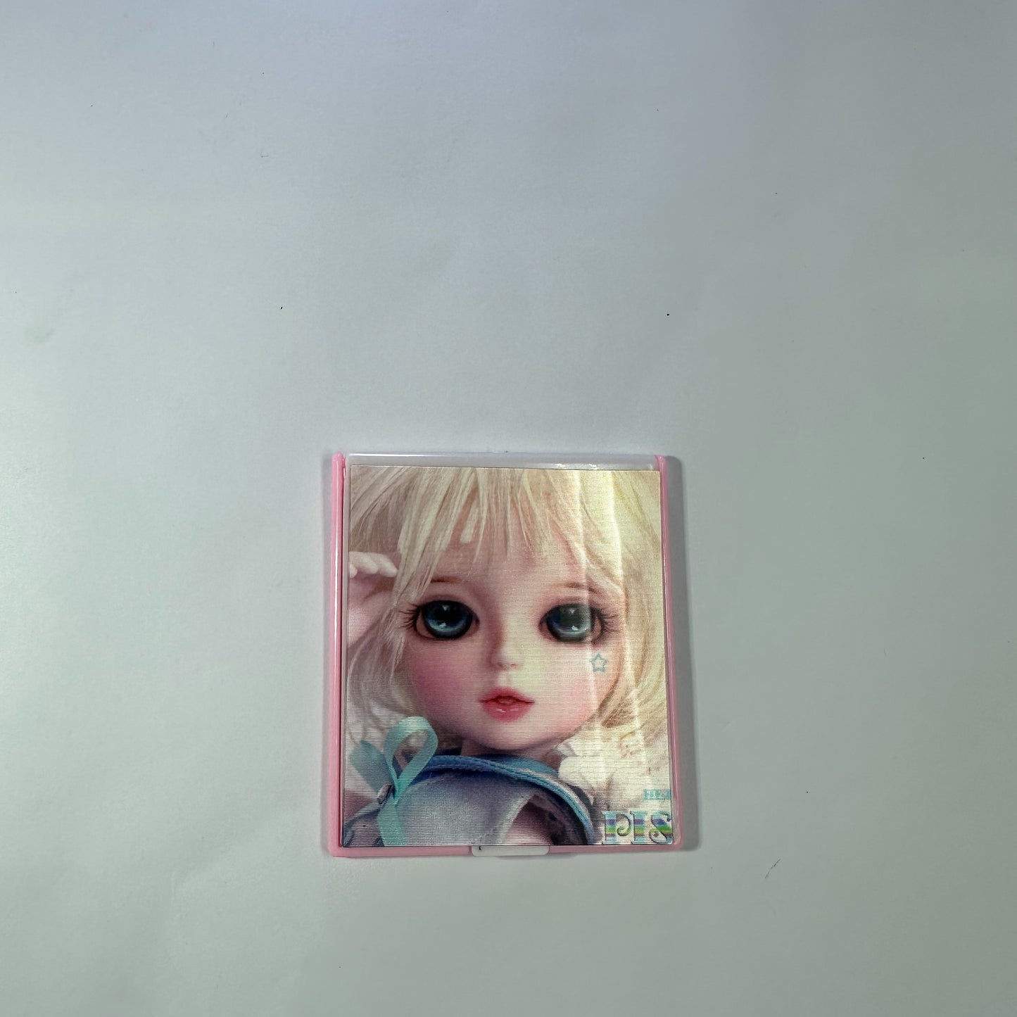 Pocket mirror with dolls