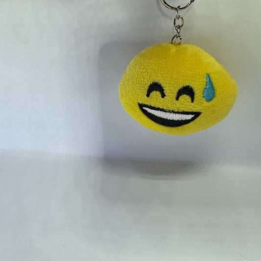 Sweat smile face fluffy keychain.