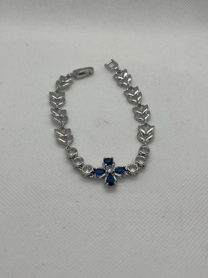 Sterling Silver Cubic Zirconia Flower &Blue Stone Bracelet