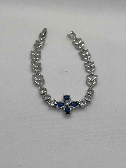 Sterling Silver Cubic Zirconia Flower &Blue Stone Bracelet