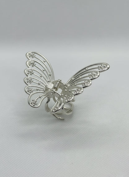Gold metal butterfly hair claw.
