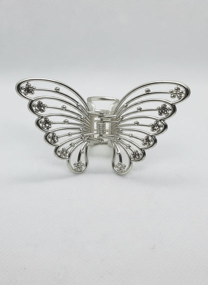 Gold metal butterfly hair claw.