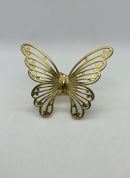 Gold metal butterfly hair claw.