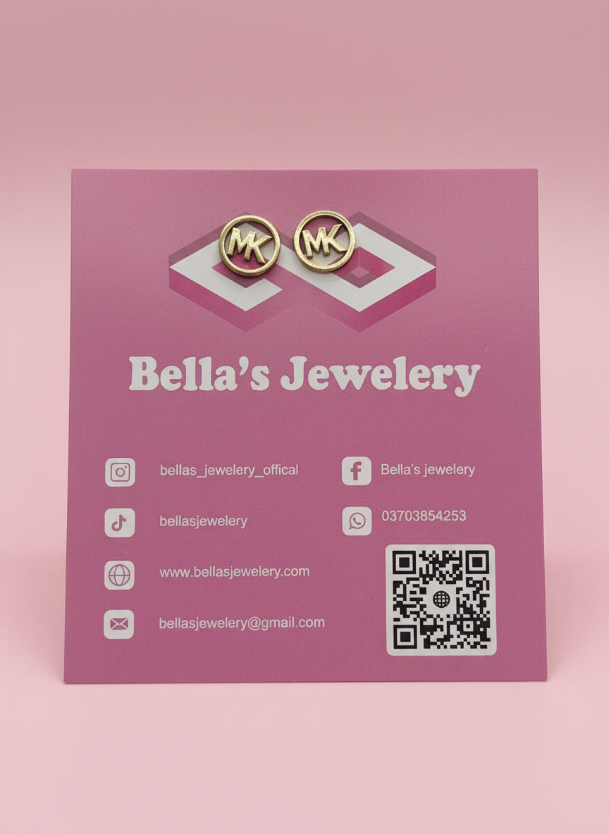 Black Or Dark-toned stud earrings with the letters "MK"