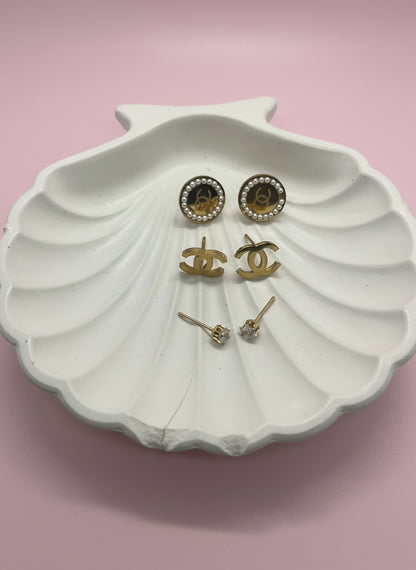 Pairs of gold-tone stud earrings