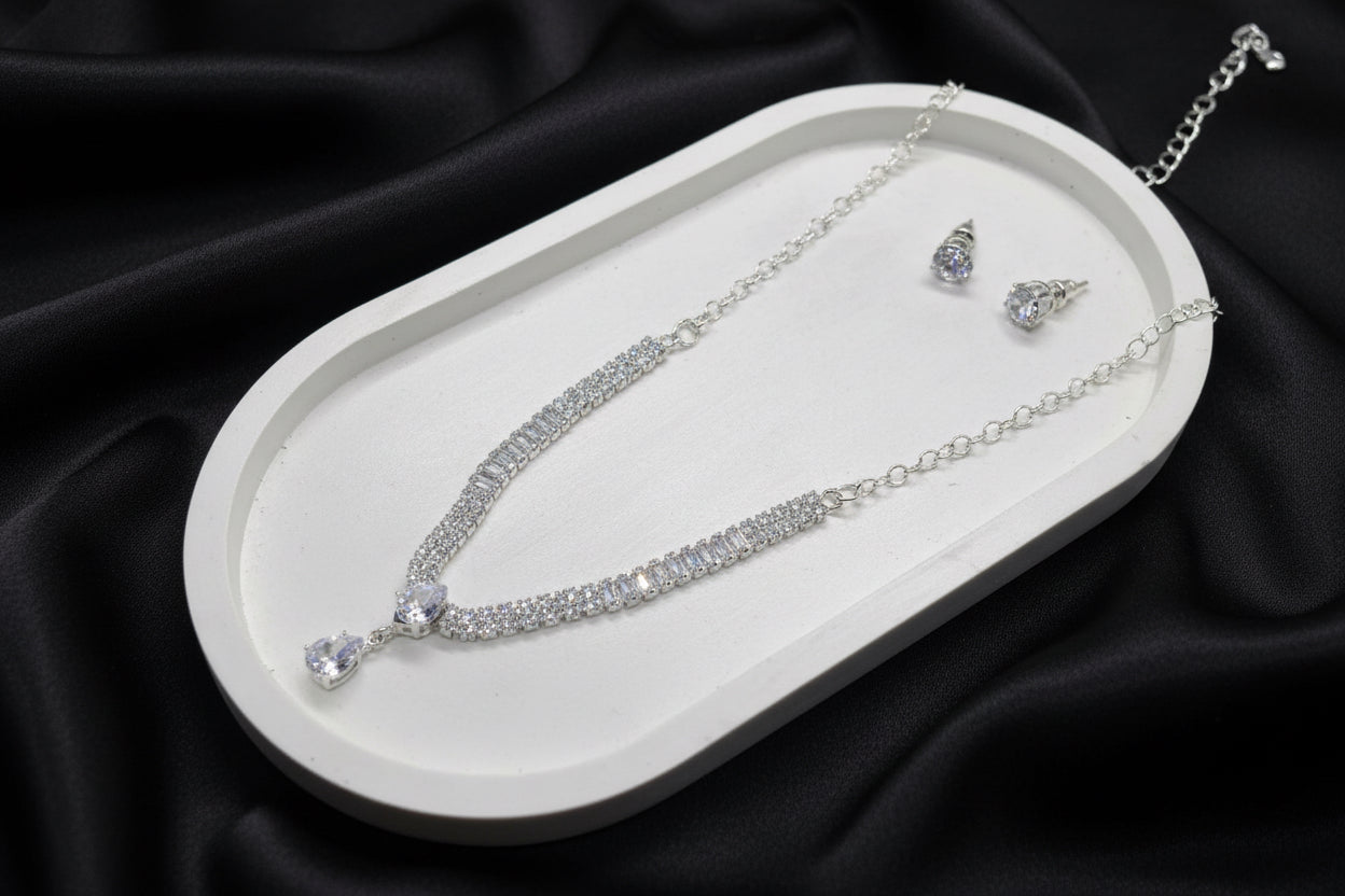 cubic zirconia baguette and pear drop necklace and earrings set