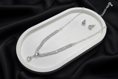 cubic zirconia baguette and pear drop necklace and earrings set