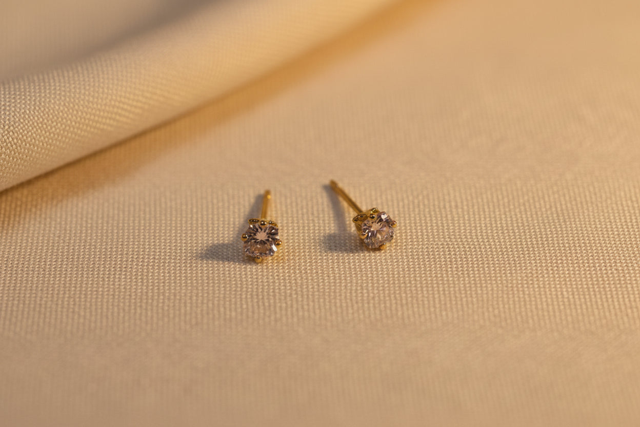 gold stud earrings Pair