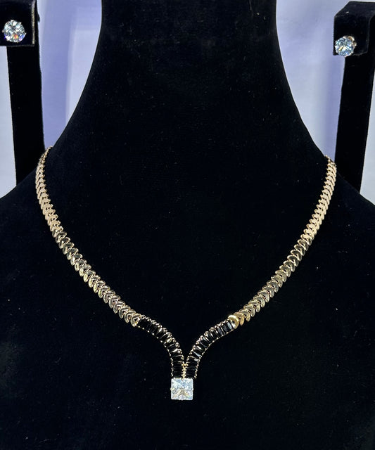 Gold Chain Necklace With A Square Cut Diamond Pendant