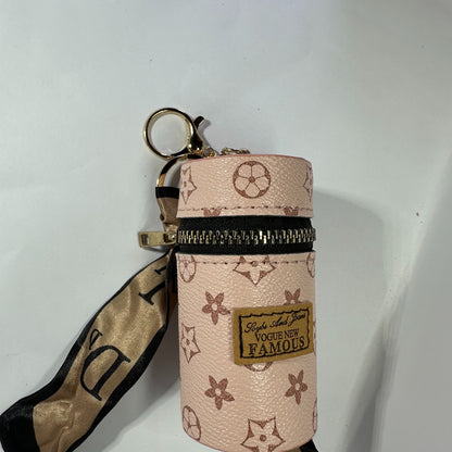 Louis Vuitton (LV) small leather bag key chain for jewelery