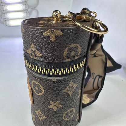Louis Vuitton (LV) small leather bag key chain for jewelery