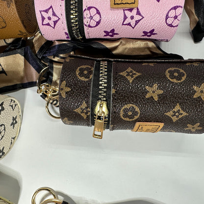 Louis Vuitton (LV) small leather bag key chain for jewelery
